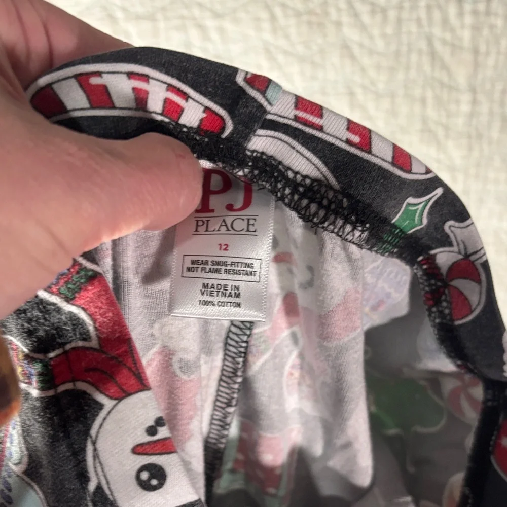 Festive Kids Pajama Set with Red and Black Design